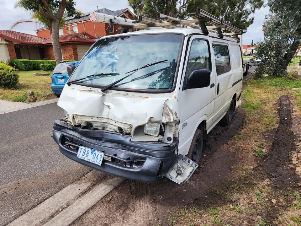 White van with front body damage