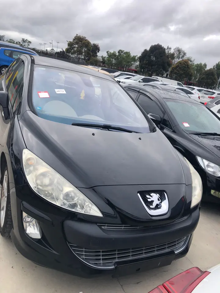 Dark hatchback viewed from the front