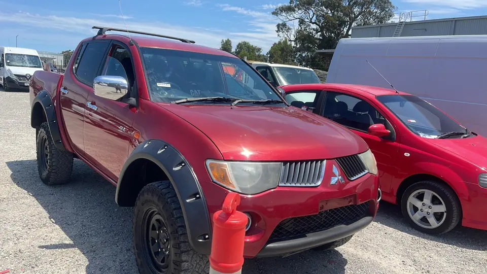 Red utility vehicle parked outside