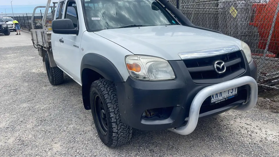 White utility vehicle viewed from the front