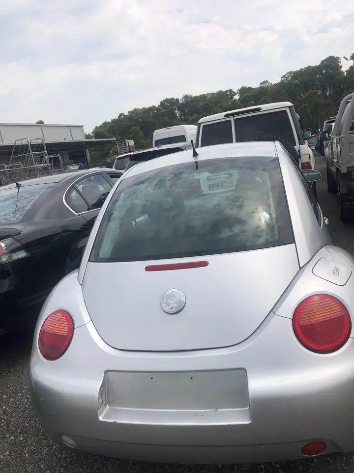 Silver hatchback viewed from the rear
