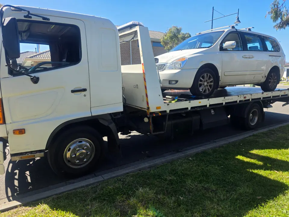 Vehicle on a flatbed transporter