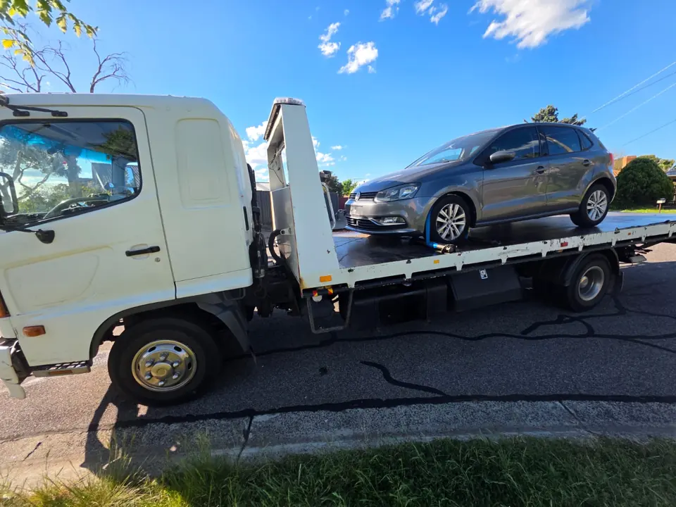 Car secured on a flatbed