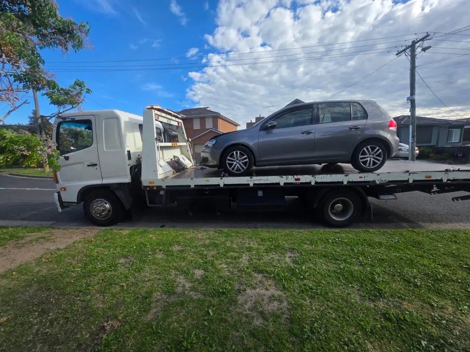 Vehicle carried on a tow truck