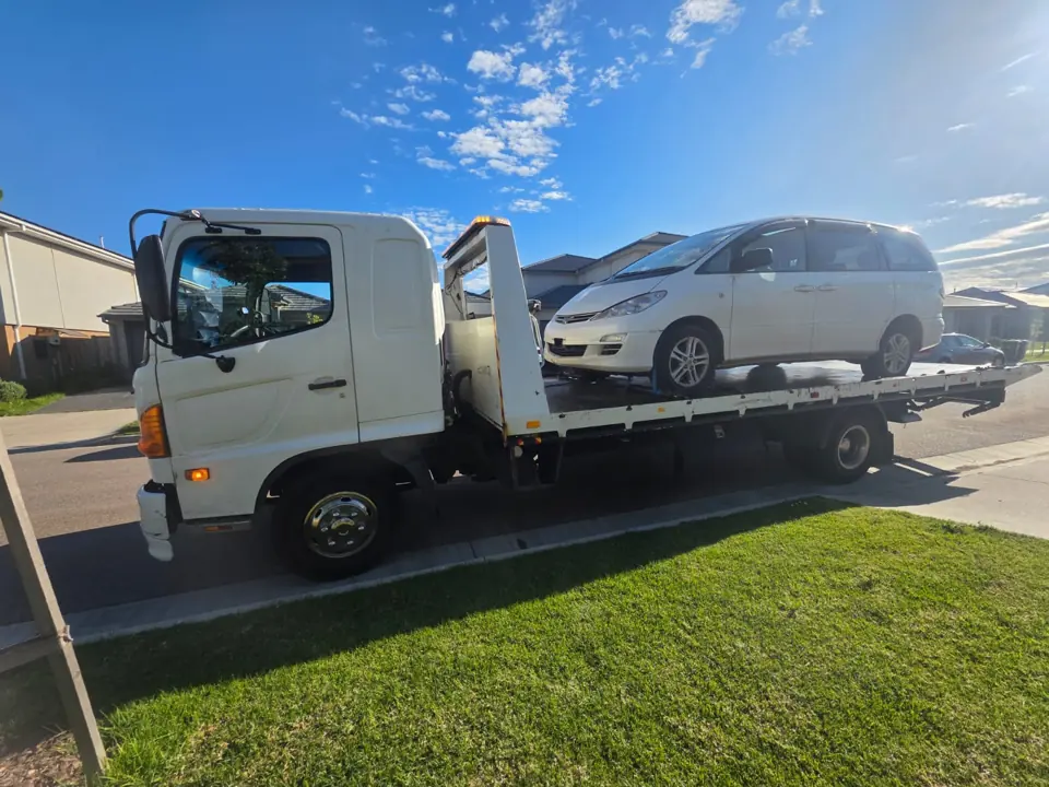 Vehicle on a flatbed outdoors