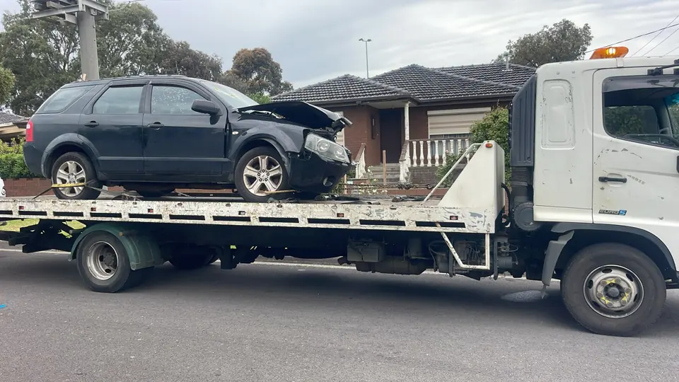 Dark SUV on a transporter