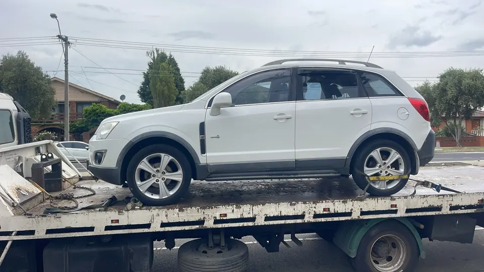 Silver SUV on a flatbed