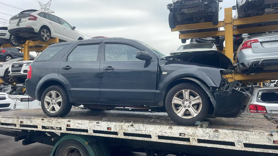 Dark SUV secured for transport
